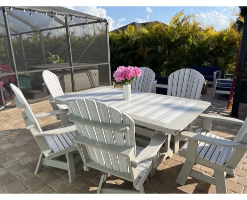 32x60in Dining Height Rectangle Table with swivel patio armchairs